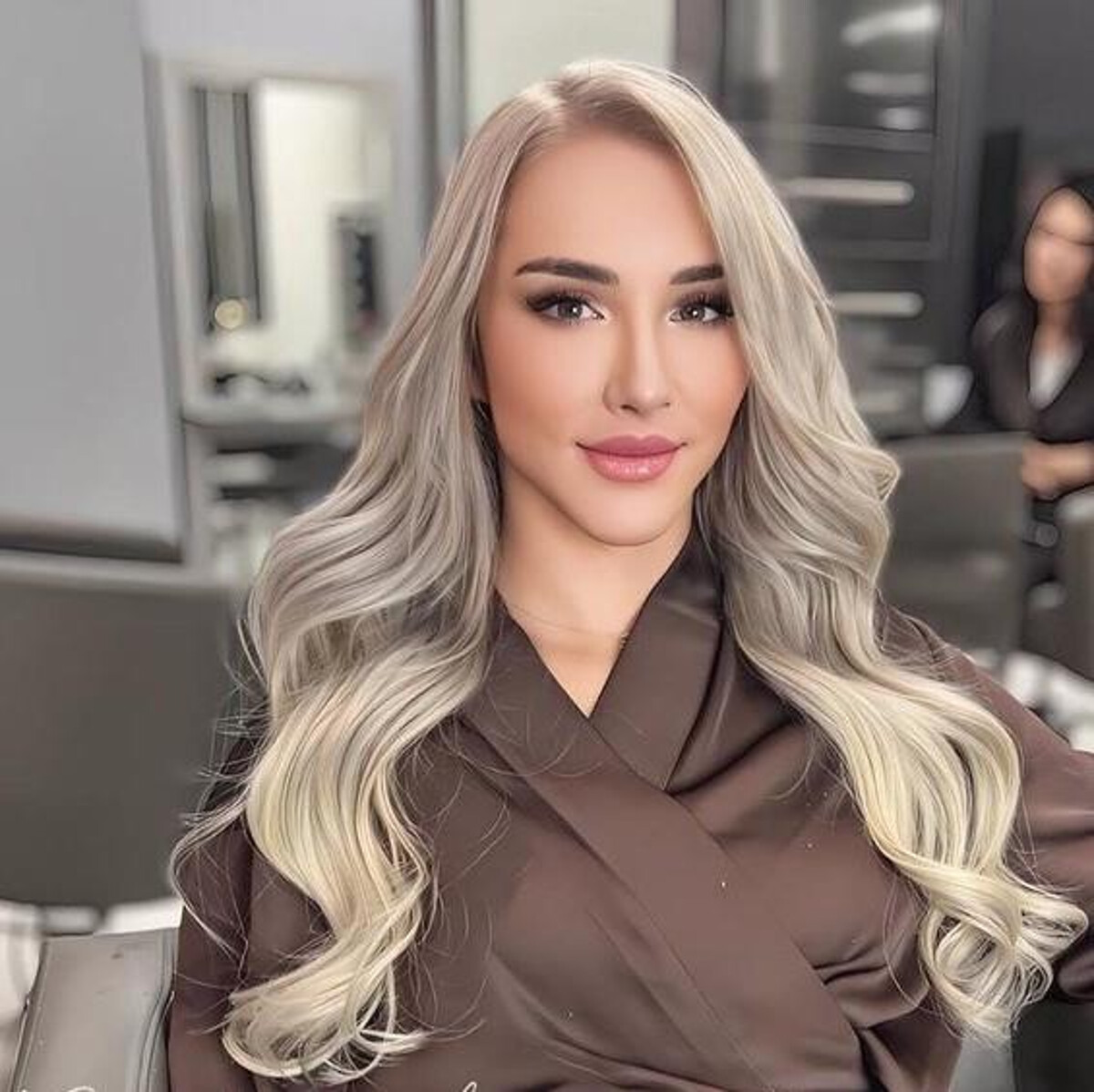 Status Hair client with seamless color-matched extensions