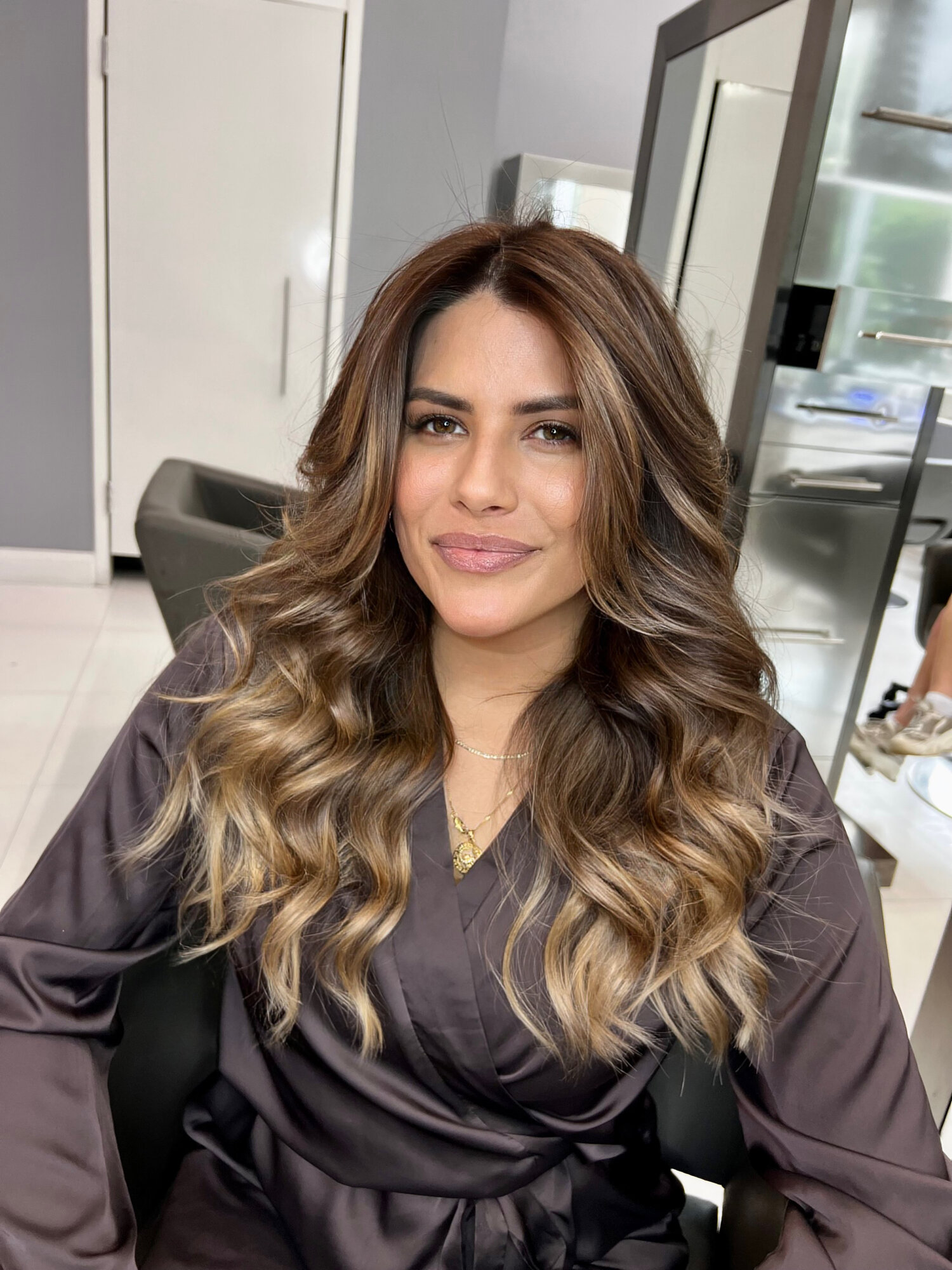 Status Hair client with thickened fine hair via INVISI Links